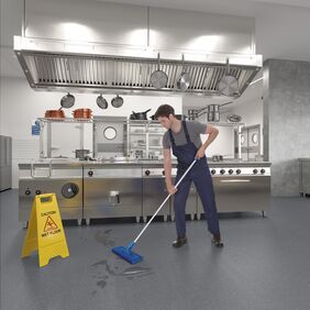 Dark grey safety flooring in a commercial kitchen