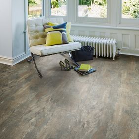 Seating area featuring slate effect flooring laid in a brickwork style in Ocean Slate 