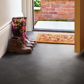 Entrance featuring stone effect flooring in Atlantic Slate using a 45° Straight laid, with half tile perimeter.