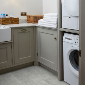 Laundry room, utility room, baskets, storage, grey stone effect flooring 