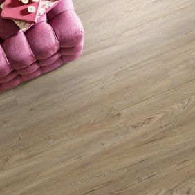 Close up of pouffe featuring light wood effect flooring Quayside Oak 