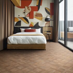 Wood effect flooring with a basket weave pattern laid in a double bedroom