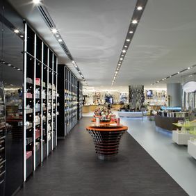 Black slate effect flooring in a department store 