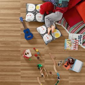 Ash wood effect flooring in childrens bedroom 