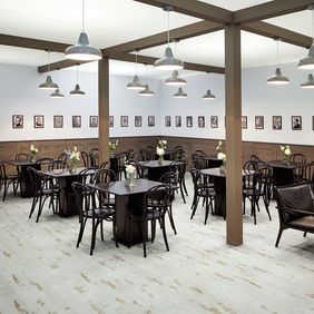  White wood effect vintage style flooring in a restaurant