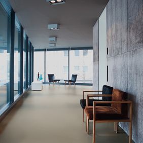 Modern commercial corridor with chairs