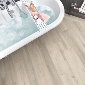 Bathroom, Bathtub, Bath tray, soap, light wood flooring 