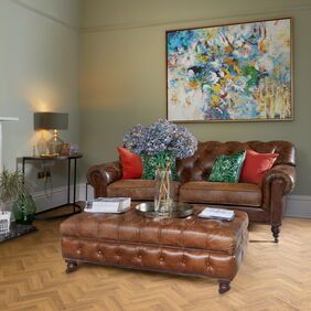 TLC Massimo in Golden Oak Small Parquet laid in a living room 