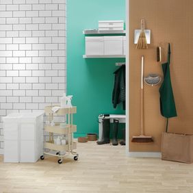 Light stone effect flooring in a utility cupboard