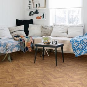 Oak wood effect flooring in a parquet design in a residential house