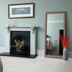 Fireplace, standing mirror, accessories, picture, concrete effect flooring 