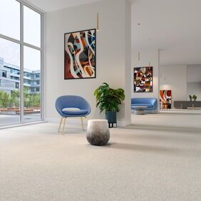 Polyflor Expona Fabrik in Light Beige lad in a communal area