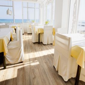 Beach front restaurant with sea views and rustic effect flooring 