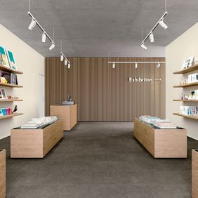 Dark coloured flooring laid in a retail book store