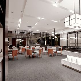Dark grey coloured flooring in a restaurant with burnt orange coloured chairs and modern lighting