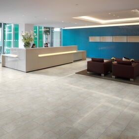 TLC Massimo in Limed Sandstone laid in a reception/lobby
