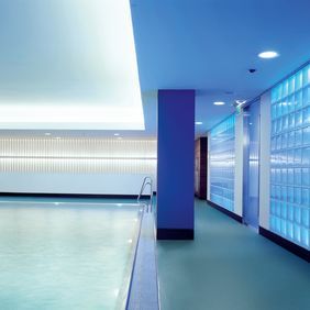 Dark blue colour safety flooring in a Swimming pool area 