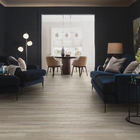 Living room with dark walls and neutral oak flooring
