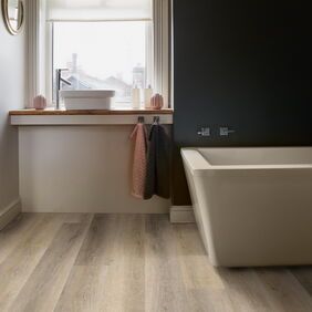 TLC Original in Coach House Oak laid in a bathroom