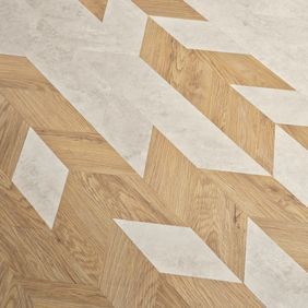 Close up of Miniature chevron White Metalstone tiles, alongside Sienna Oak. 