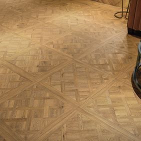 Upclose image of oak versailles effect flooring