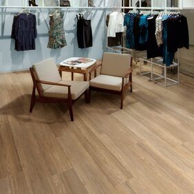 Oak effect flooring laid in a clothing store