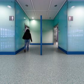 Grey colour safety flooring in a toilet entrance 