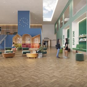 Oak effect parquet flooring laid n a student seating zone with people