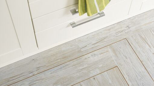 LVT flooring with marquetry strip inlay