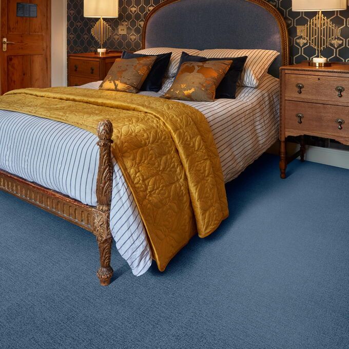 Polyflor Expona Fabrik in Dark Blue laid in a bedroom