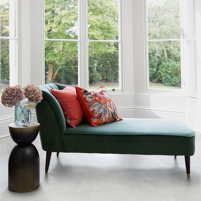 Chaise Lounge, cushions, bay windows, concrete effect flooring 