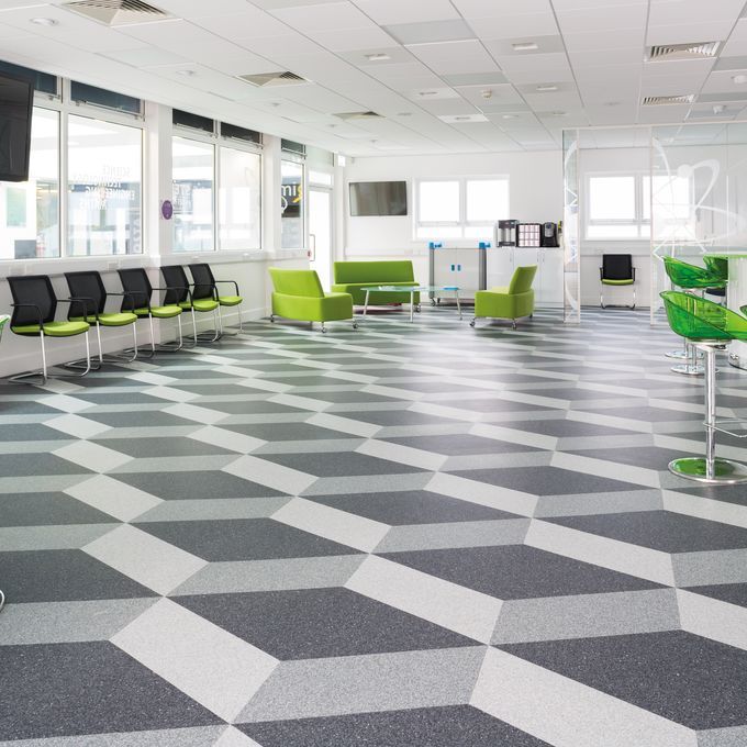 light and dark abstract flooring in a school break area 