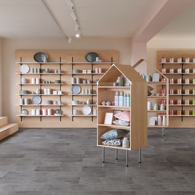 Dark grey coloured flooring laid in a homeware retail store