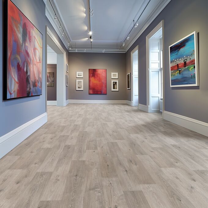 Oak effect flooring straight laid in an art gallery walkway