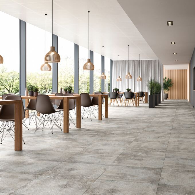 Light grey concrete effect flooring in a restaurant