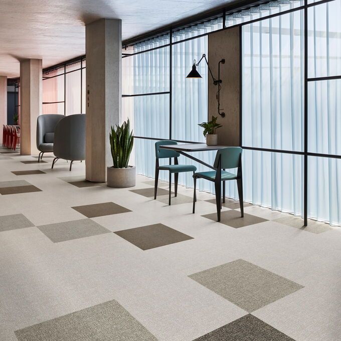 Polyflor Expona Fabrik in Mid Beige laid in an office communal area 