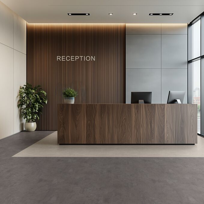 Dark concrete effect flooring laid in a reception area