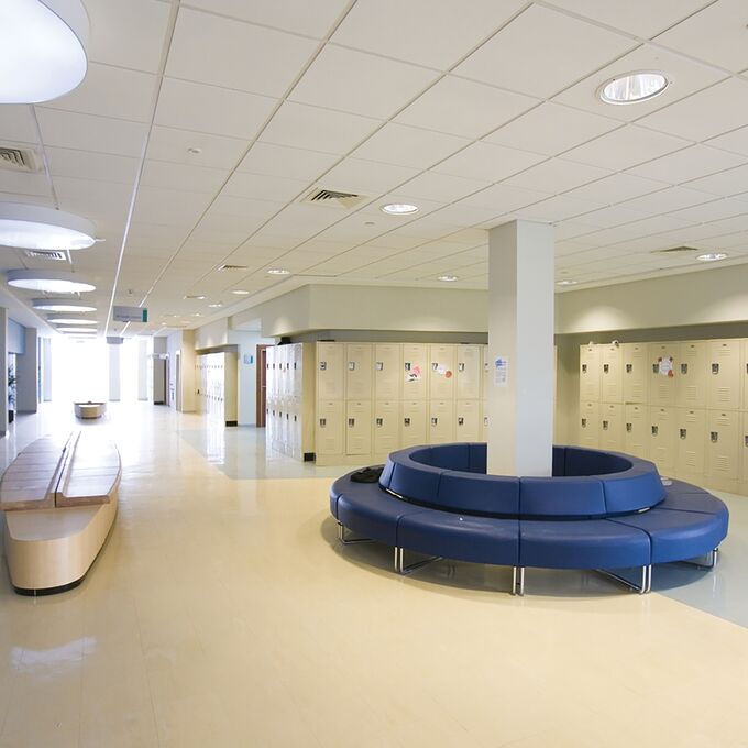 Higher education corridor with lickers and wood effect flooring