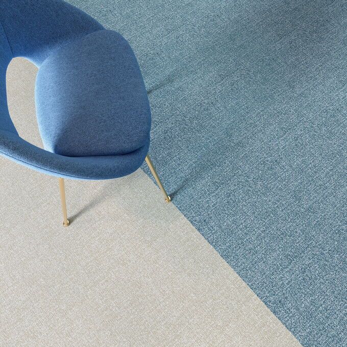 Polylfor Expona Fabrik in Light Blue and Light Beige with a chair