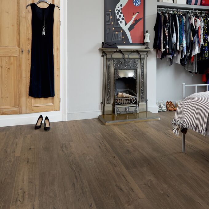 Bedroom, Bed, clothes rain, fireplace, oak flooring 