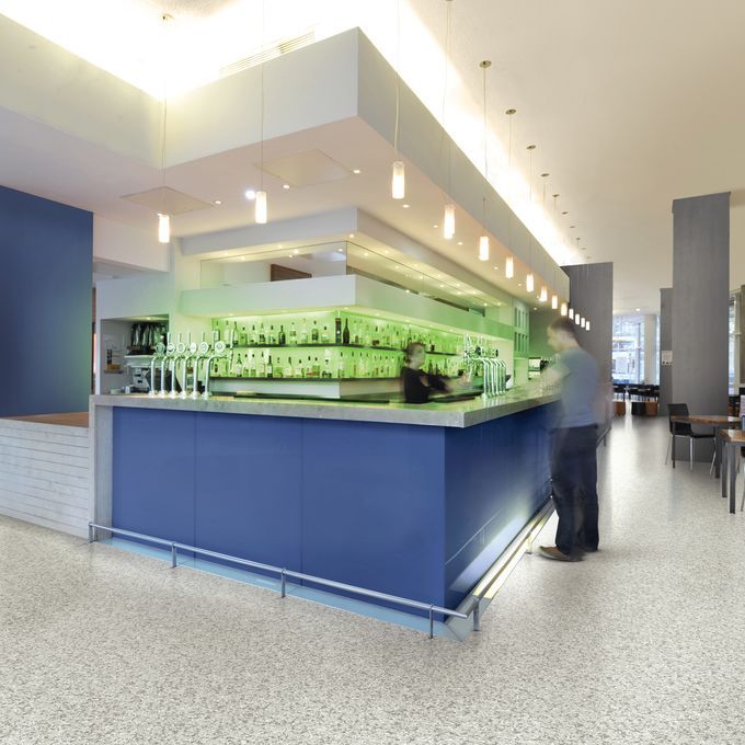  high density flake decoration, grey safety flooring in a bar area 