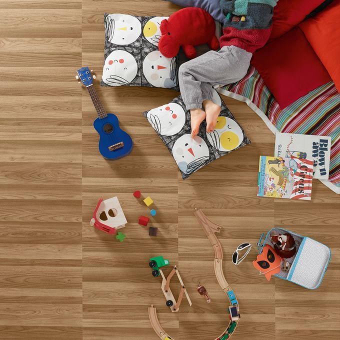 Ash wood effect flooring in childrens bedroom 