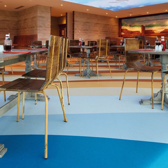 Restaurant with multiple shades of blue Polyflor flooring