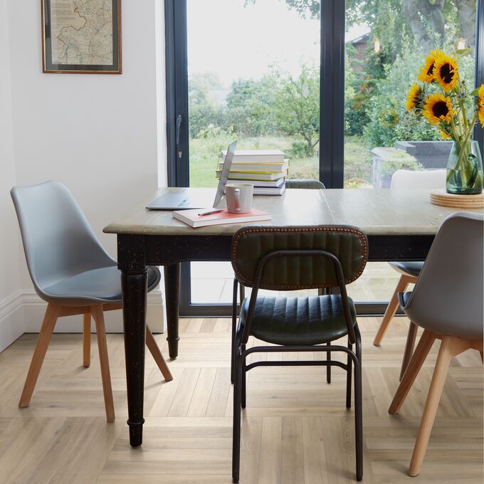 Dining table, chairs, bi fold doors, pictures flowers, vase, parquet flooring 