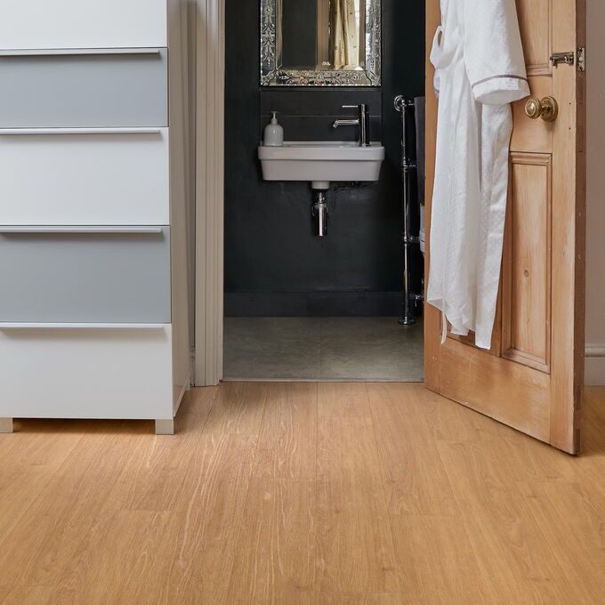 TLC Original in Country Oak laid outside an en suite