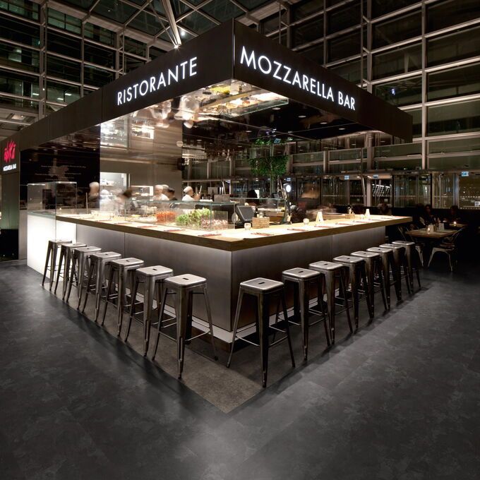 TLC Massimo in Nero Slate laid in a restaurant and bar