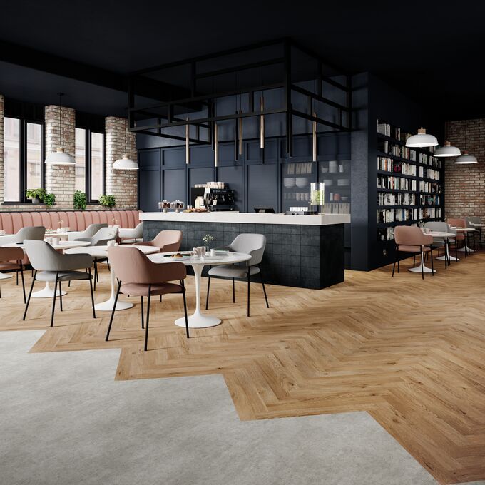 Mixture of wood and concrete effect flooring laid in a cafe eating area