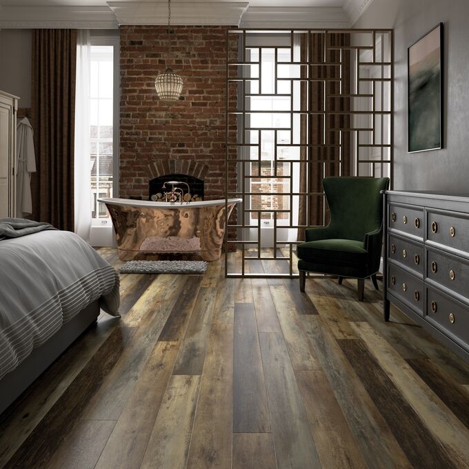 Rustic timber effect flooring laid in a bedroom