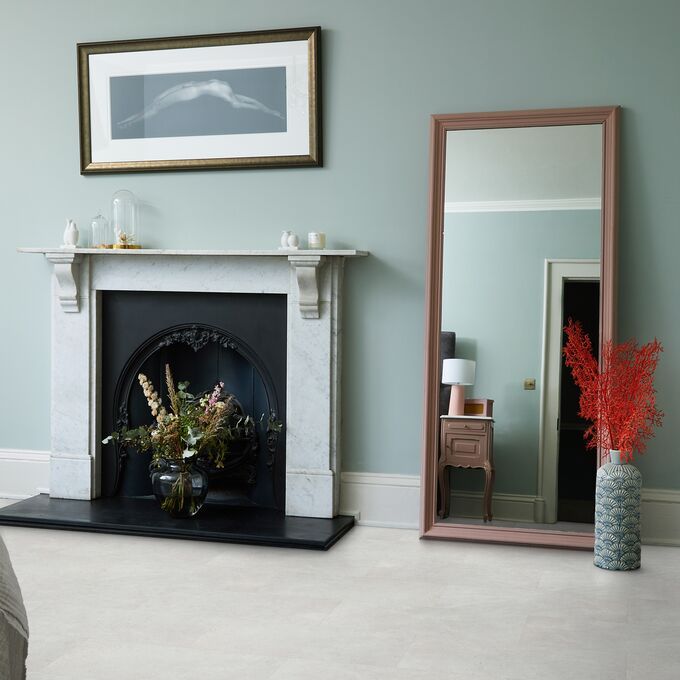 Fireplace, standing mirror, accessories, picture, concrete effect flooring 