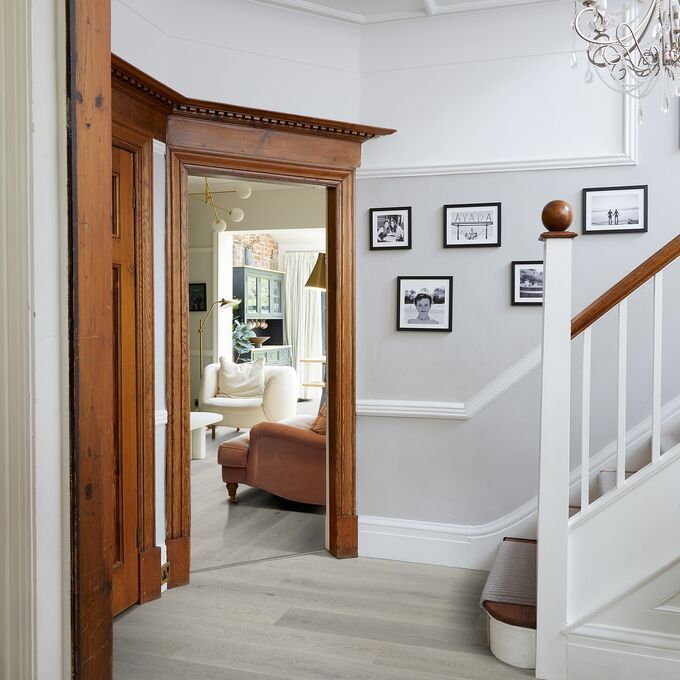 Light oak effect flooring in a residential entrance way